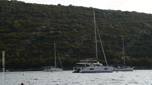 three sailing boats on the water - 3. septembar 2017 Bay of Kotor photo