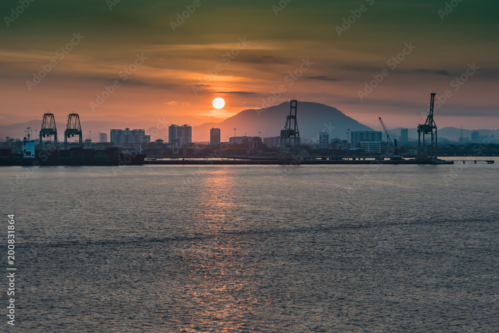 Sunrise over the port of Penang Malaysia