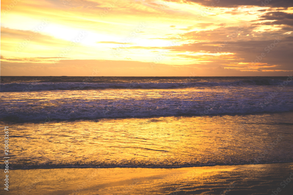 Obraz premium Sunset on the beach