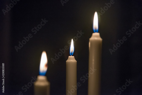 Three candles light