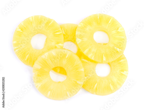 group of yellow tasty sliced pineapple isolated on white background