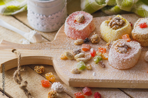 East sweets with fruits, nuts and sugar powder