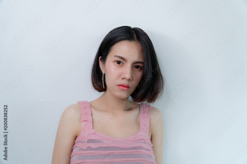 Portrait beautiful girl: Charming girl is looking to someone. Attractive girl looks so confident and happy. She has beautiful and charming eyes. And her breasts are interesting. Copy space. Portrait beautiful girl: Charming girl is looking to someone. Attractive girl looks so confident and happy. She has beautiful and charming eyes. And her breasts are interesting. Copy space.