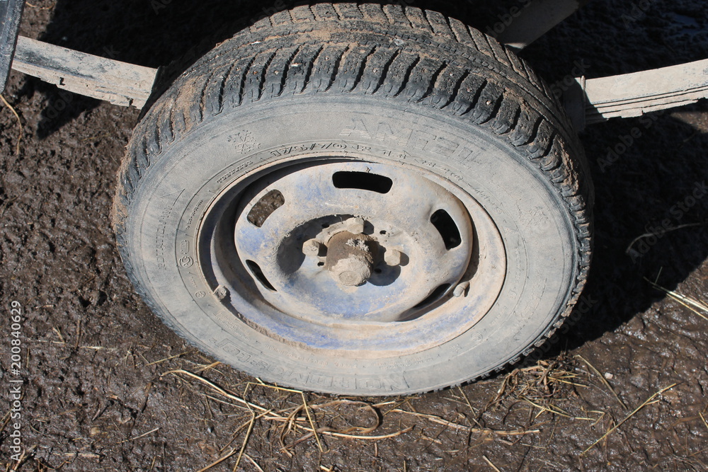 wheel, tire, car, tyre, truck, vehicle, rubber, flat, isolated, transportation, automobile, wheels, tractor, auto, transport, road, metal, black, white, off-road, equipment, dirty, construction, big, 