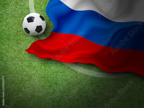 Soccer ball and russia flag on green grass in stadium with copy space