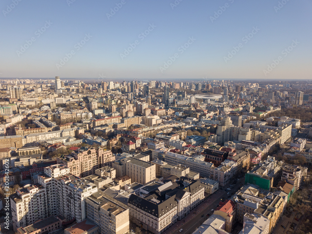City landscape of Kiev with modern and old houses roads with cars, Ukraine. Drone photography