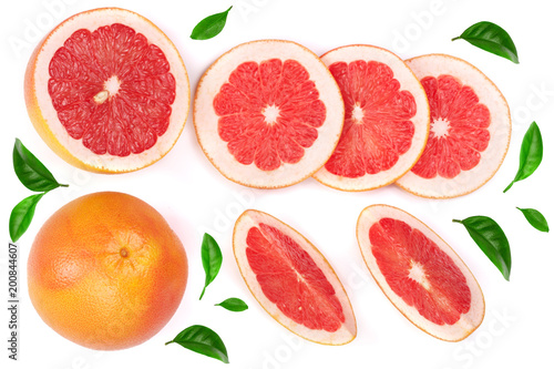 Grapefruit and slices decorated with green leaves isolated on white background. Top view. Set or collection