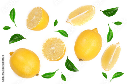 lemon and slices decorated with green leaves isolated on white background. Flat lay, top view