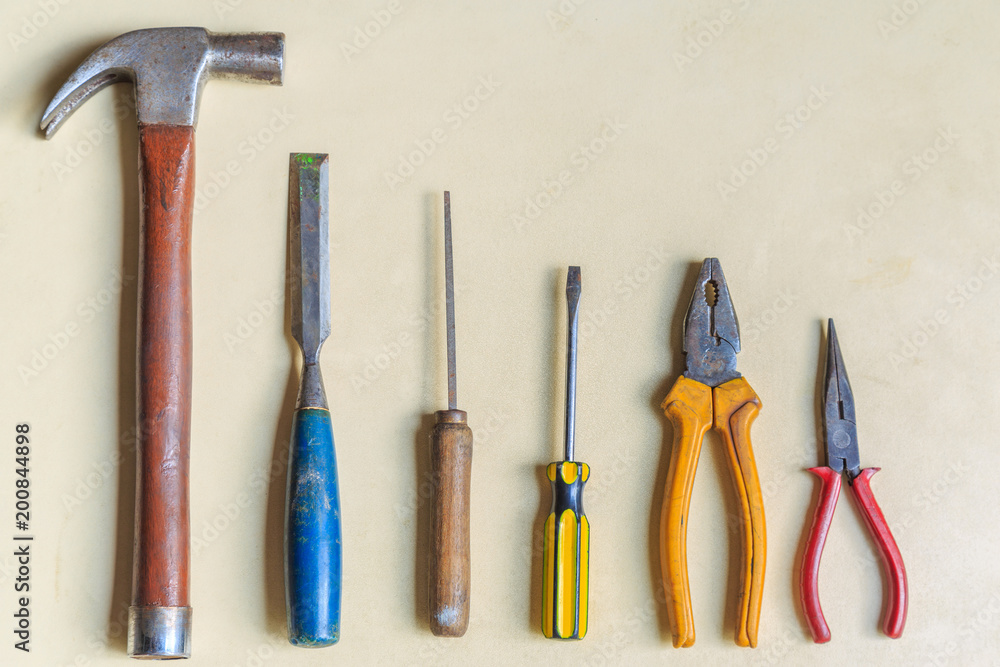 Construction tools on wooden background. Construction tools on wooden background.