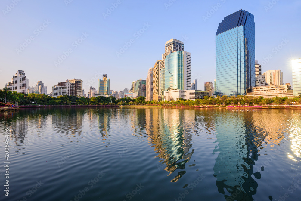 Lake view with reflections of the city / high building in the city lake view