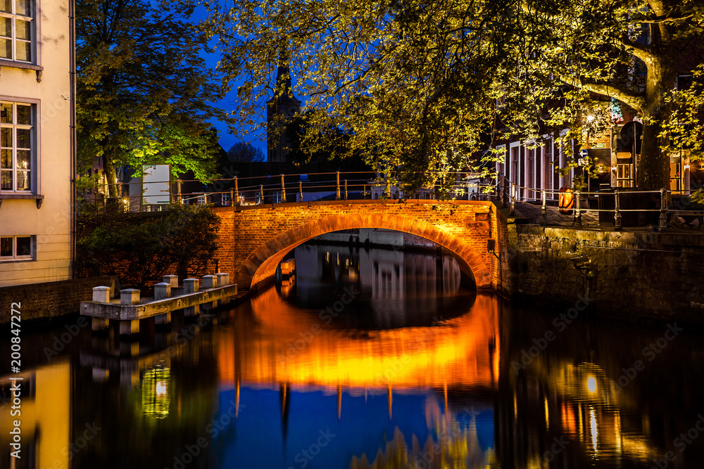 Night view of Bruges city, Belgium, nightshot of Brugge canals, traditional belgium architecture