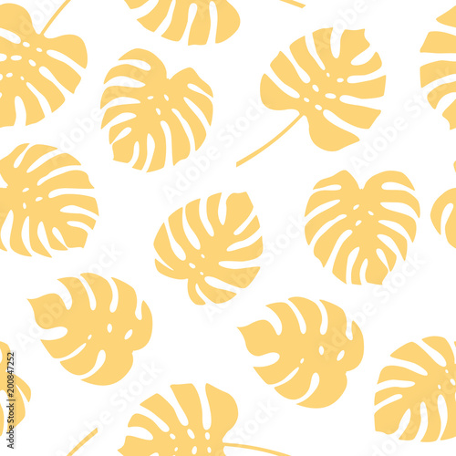 Seamless pattern of monstera leaves. Tropical leaves of palm tree background