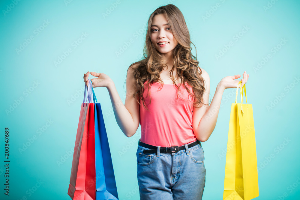 Attractive cute girl in with the shopping bags