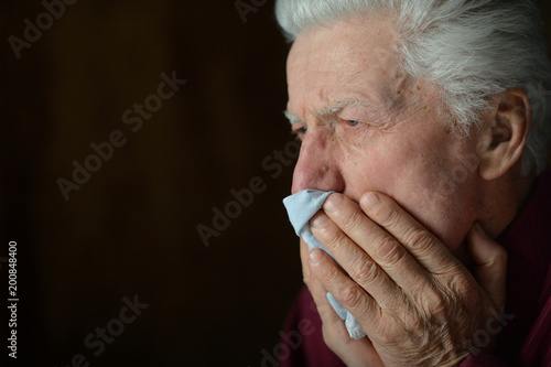 Portrait of sick senior man posing