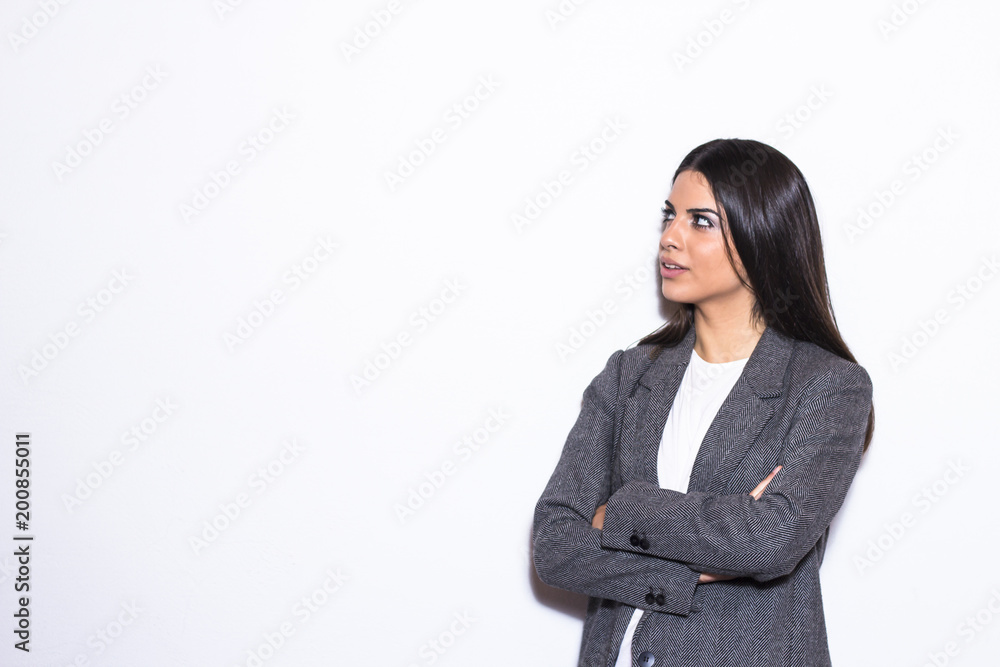 Portrait of young businesswoman on white background.
