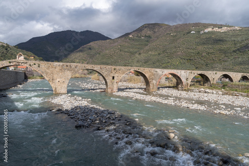 Roman stone bridge, Taggia, Liguria, Italy photo