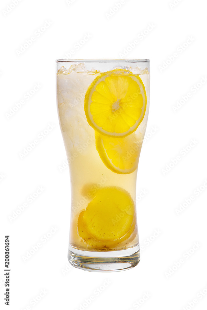 A single-colored, yellow, transparent cocktail in a high glass with crushed ice of frappe and lemon and ginger. Side view. Isolated white background. Drink for the menu restaurant, bar, cafe A single-colored, yellow, transparent cocktail in a high glass with crushed ice of frappe and lemon and ginger. Side view. Isolated white background. Drink for the menu restaurant, bar, cafe