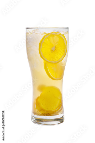 A single-colored, yellow, transparent cocktail in a high glass with crushed ice of frappe and lemon and ginger. Side view. Isolated white background. Drink for the menu restaurant, bar, cafe