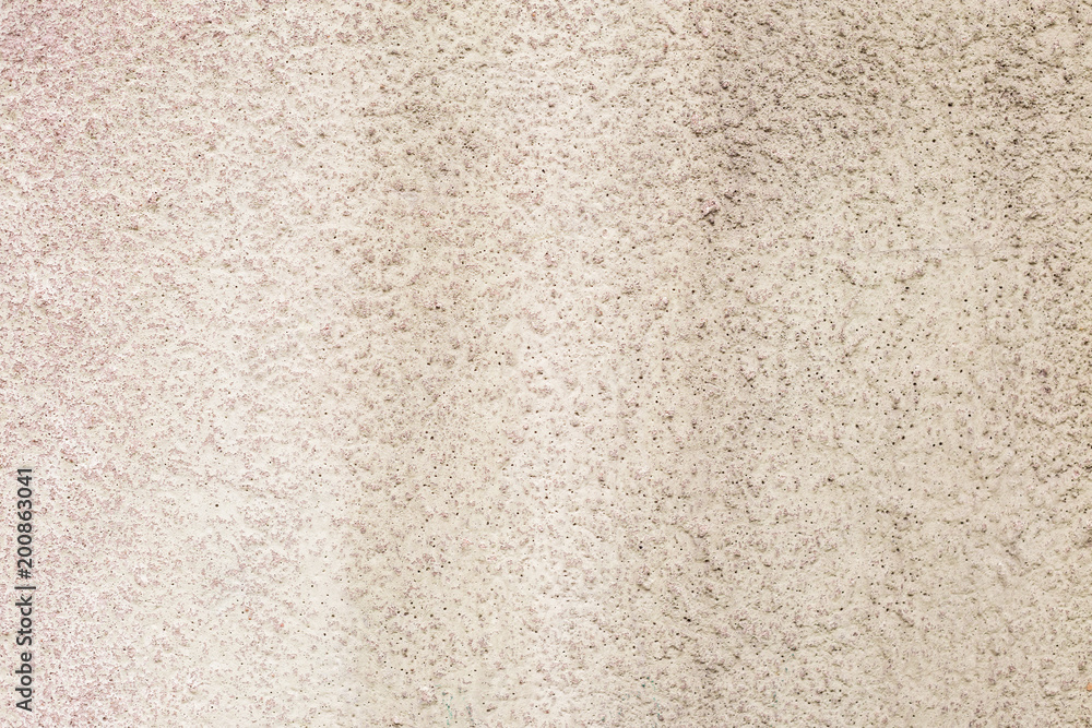Fototapeta premium White ragged, rough wall concrete background.