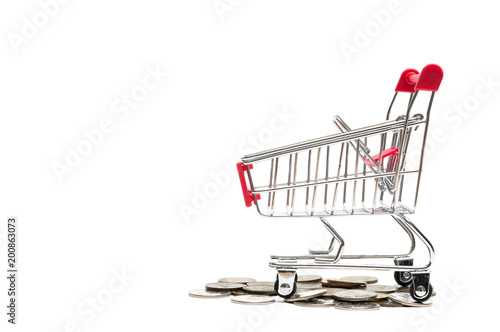 Korean coins and shopping cart on white background : economy concept © photocj