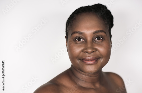Mature African woman with beautiful skin smiling © mavoimages