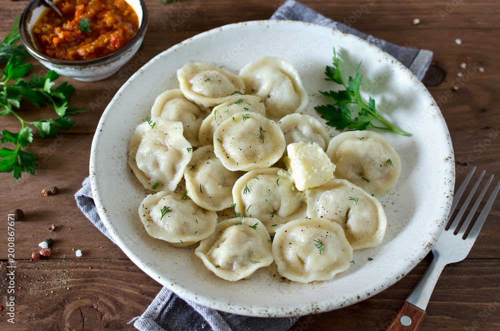 Dumplings with meat, spiced with pepper and dill