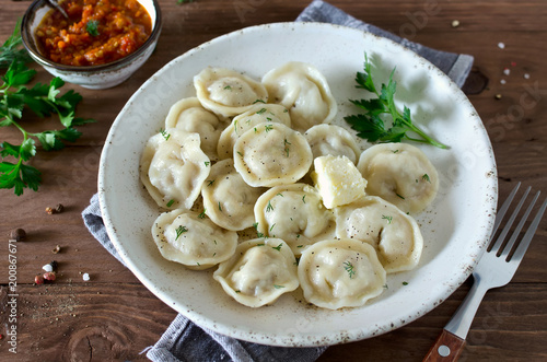 Dumplings with meat, spiced with pepper and dill