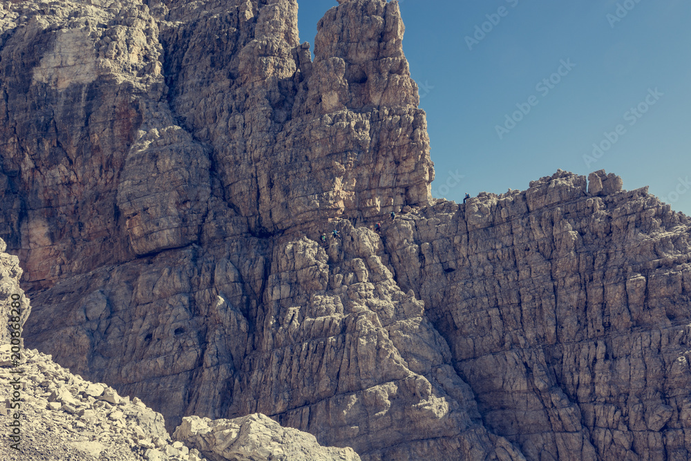 Via ferrata route carved into rock.