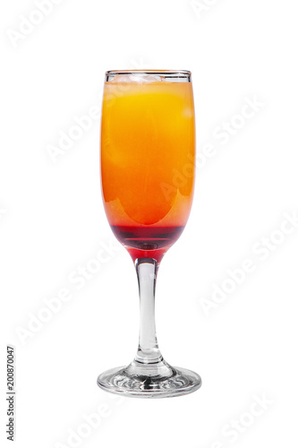 Multicolored, two-layered yellow and orange, red cocktail in a tall glass with ice cubes with orange flavor. Side view. Isolated white background. Drink for the menu restaurant, bar, cafe