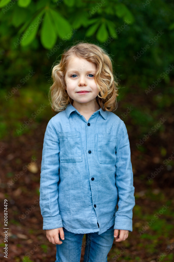 Happy small child enjoying the nature Happy small child enjoying the nature