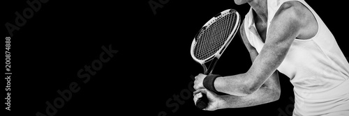 Athlete playing tennis with a racket  © vectorfusionart