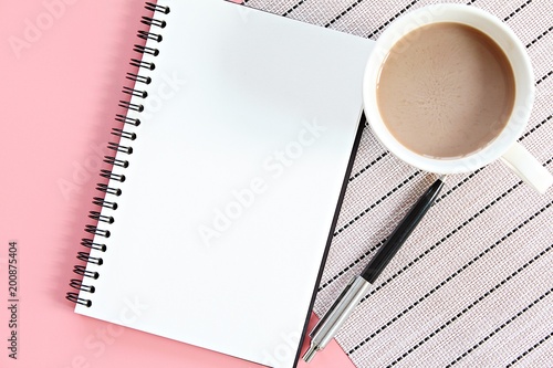 Still life, business, office supplies, planning or education concept : Top view or flat lay of open notebook with blank pages and coffee cup on office table with copy space ready for adding or mock up