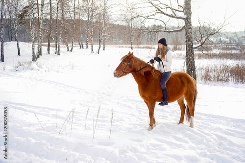 Girl riding a horse