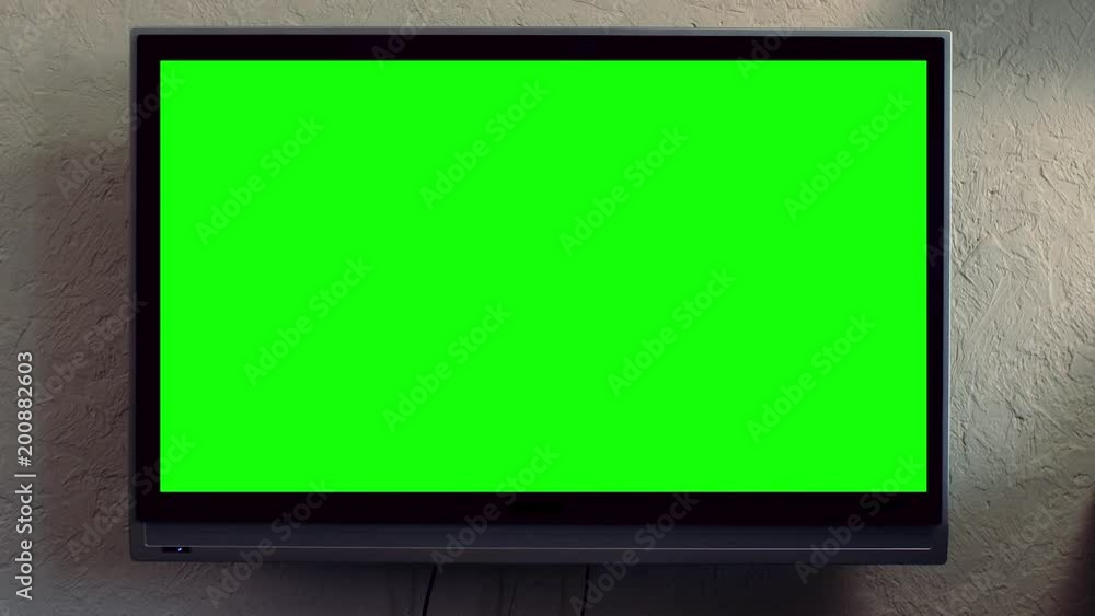Flat screen TV with green screen composited. TV or television green