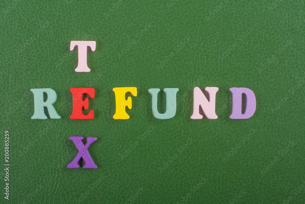 TEX REFUND word on green background composed from colorful abc alphabet block wooden letters, copy space for ad text. Learning english concept. TEX REFUND word on green background composed from colorful abc alphabet block wooden letters, copy space for ad text. Learning english concept.