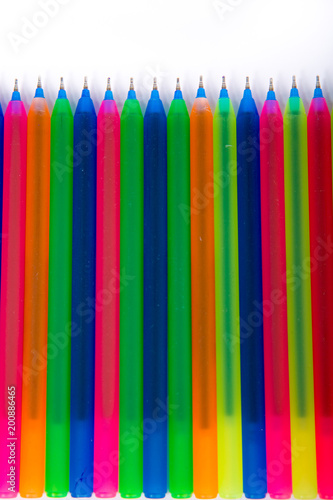 Colorful office supplies in white background