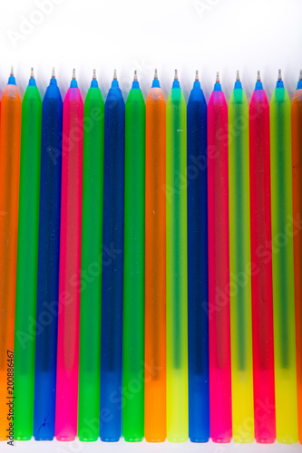 Colorful office supplies in white background