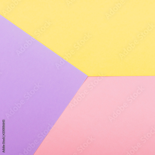 Texture background of fashion pastel colors: pink, yellow and purple geometric pattern papers. minimal abstract