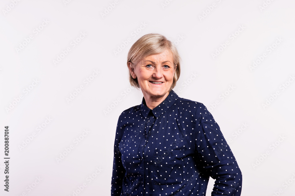 Portrait of a senior woman in studio. Portrait of a senior woman in studio.