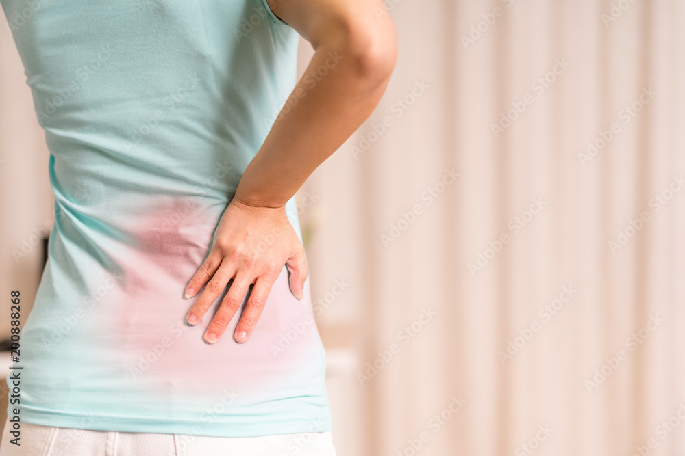 back pain at home. women suffer from backache. healthcare and medical concept back pain at home. women suffer from backache. healthcare and medical concept