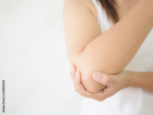 Wallpaper Mural Closeup female's elbow. Arm pain and injury. Health care and medical concept. Torontodigital.ca