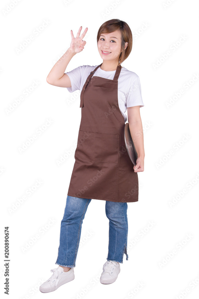 Smiling woman in apron showing OK on white background Smiling woman in apron showing OK on white background