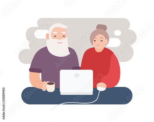 Pair of smiling elderly man and woman surfing internet together