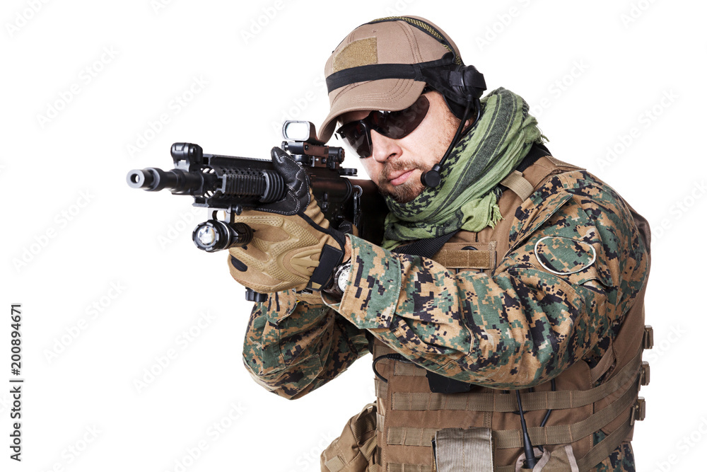 Fototapeta premium Studio shot of United States Marine with rifle weapons in uniforms. Military equipment, army helmet, combat boots, tactical gloves. Isolated on white, weapons, army, patriotism concept