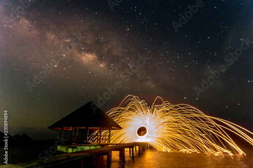 Llight painting with beautiful scenery of milkyway in of night