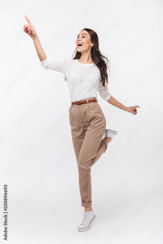 Full length portrait of a joyful asian businesswoman Full length portrait of a joyful asian businesswoman