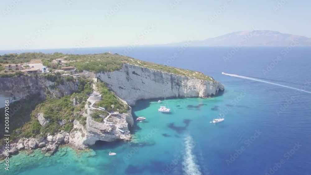 4K (UHD) Aerial view of Agios Nikolaos blue caves in Zakynthos (Zante) island, in Greece - Log 4K (UHD) Aerial view of Agios Nikolaos blue caves in Zakynthos (Zante) island, in Greece - Log