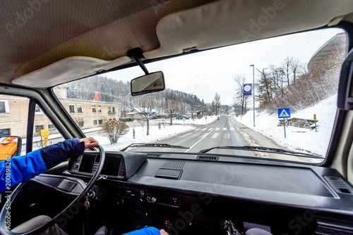 Fototapeta Naklejka Na Ścianę i Meble -  Interior view of delivery man driving a van or truck.