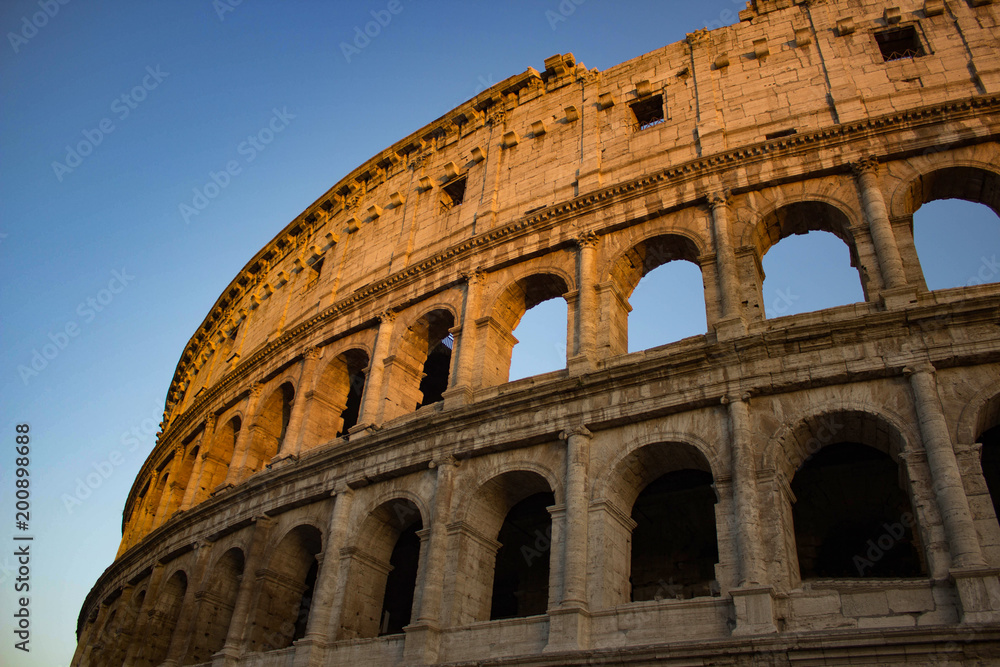 Old Colosseum In Rome, Italy With Sunset