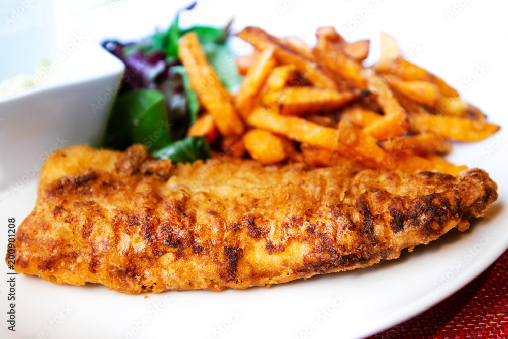 British Traditional fish and chips and tartar sauce British Traditional fish and chips and tartar sauce
